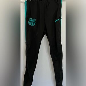 Gently used youth medium Nike dry fit FC Barcelona retro sport pants